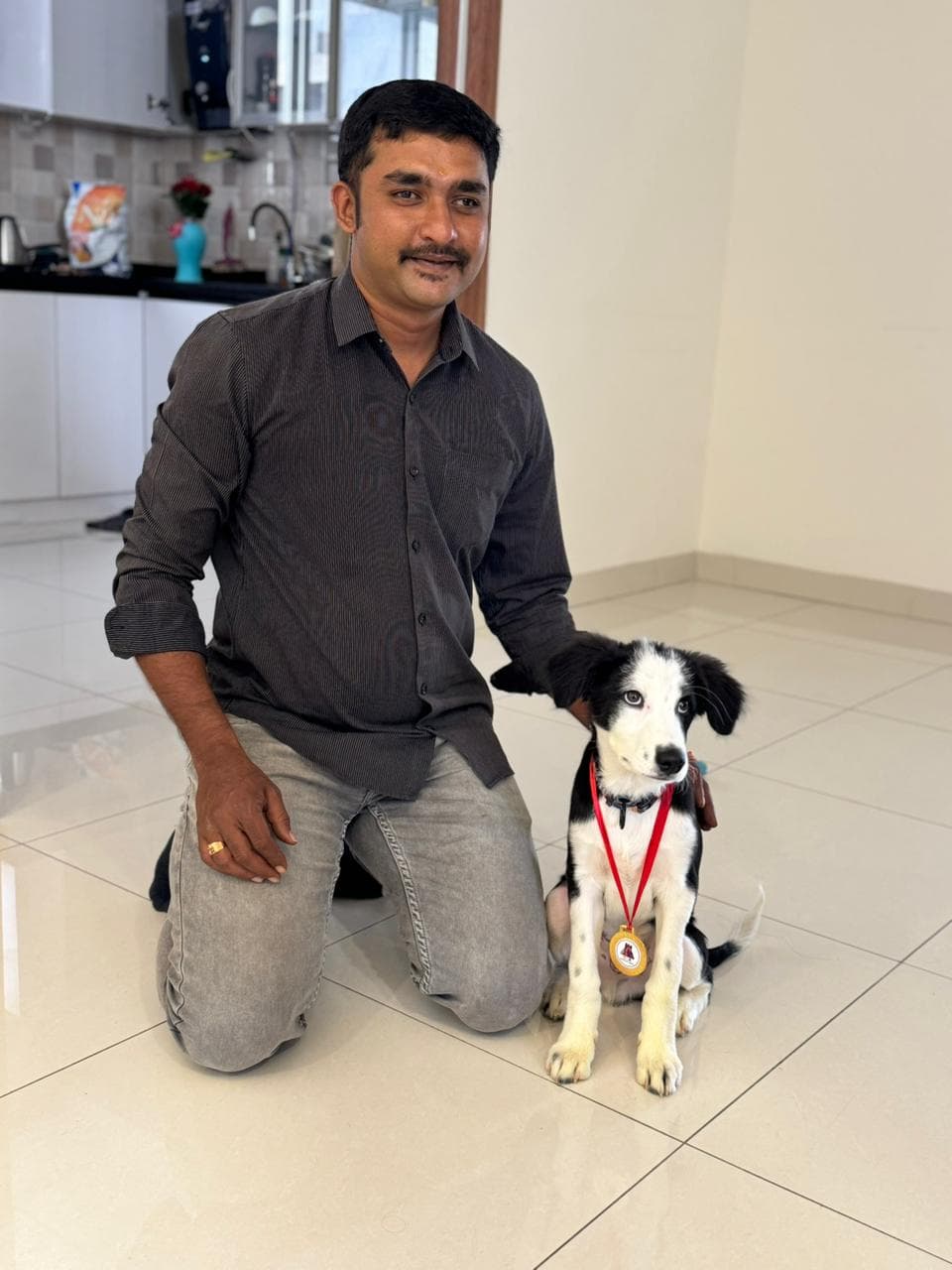 Puppy wearing its first competition medal